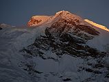 20 First Rays Of Sunrise On Shishapangma Main And East Summits And East Face From Kong Tso The first rays of sunrise silhouette the Shishapangma main summit (8012m) and the central summit on the right with the steep east face from Kong Tso camp (5198m).